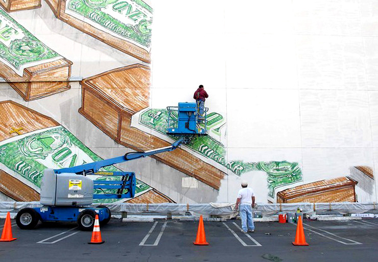 Mural by Italian street artist Blu being painted over by MOCA workers, December 2010. Photo: Casey Caplowe. 