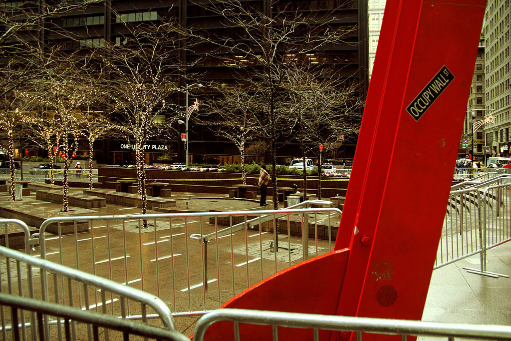 Mark di Suvero's <i>Joie de Vivre</i> in an empty Zuccotti Park, after the eviction of the Occupy Wall Street protesters, December 2011. Photo: Trevor Patt.
