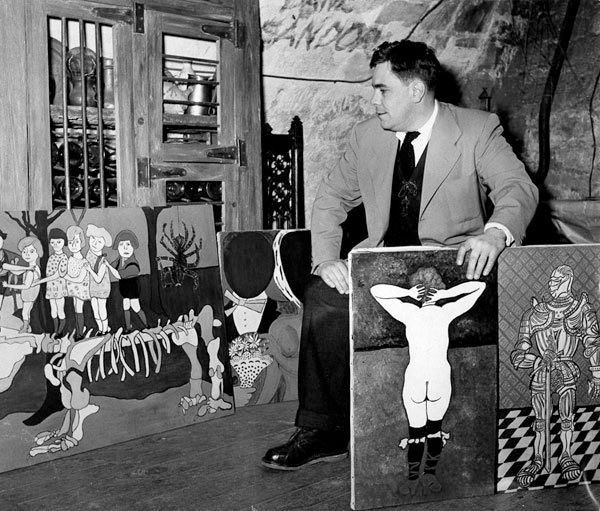 William N. Copley with his own paintings in Paris, 1951, two years after he closed the Copley Galleries and left Los Angeles. Photo: Mike De Dulmen. Courtesy the Estate of William N. Copley.