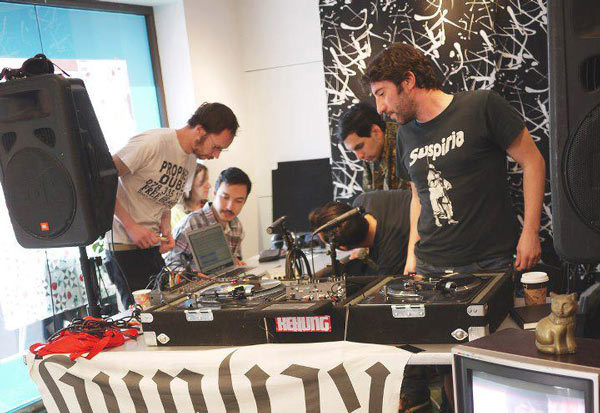 KCHUNG co-founder Solomon Bothwell (left) and friends broadcasting live from the MOCA bookstore on May 10, 2013.