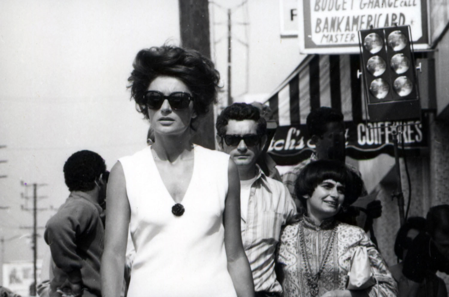 Varda (right) with Jacques Demy and Anouk Aimée on set of <em>Model Shop</em>, 1969. Courtesy Ciné-Tamaris.