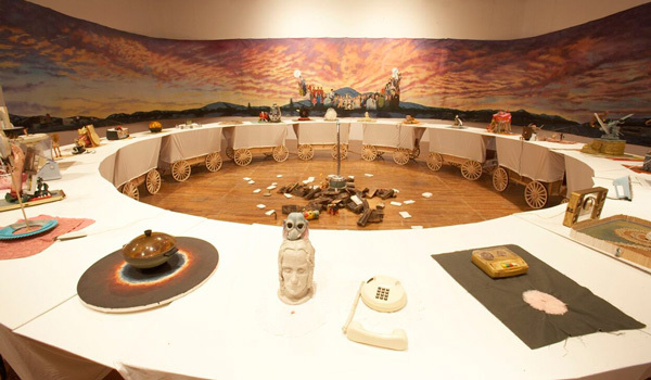 Left: Jim Shaw, <em>The Donner Party</em>, 2003. Mixed media. Installation View at P.S.1, 2007. Photo by Matthew Septimus. Courtesy P.S.1 Contemporary Art Center.
