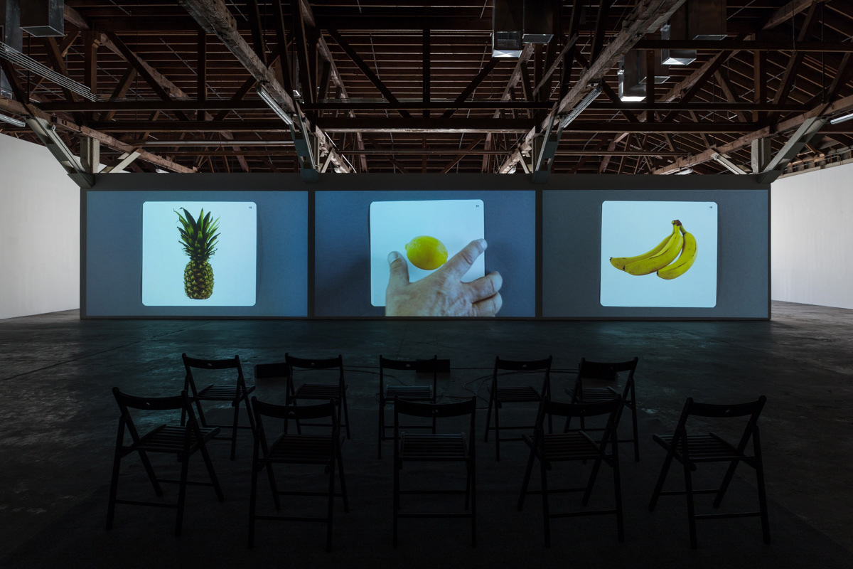 Kerry Tribe, <em>The Aphasia Poetry Club</em>, 2015. Three-channel video with sound, 28:27 minutes. Installation view, The Loste Note, April 10–May 31, 2015, 356 S. Mission Rd. Photo: Fredrik Nilsen Studio. Courtesy the artist and 356 S. Mission Rd.