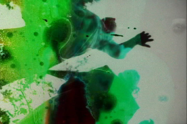 Jennifer West, <em>Nirvana Alchemy Film, (16 mm black & white film soaked in lithium mineral hot springs, pennyroyal tea, doused in mud, sopped in bleach, cherry antacid and laxatives - jumping by Finn West & Jwest)</em>, 2007. 2 min, 51 sec.