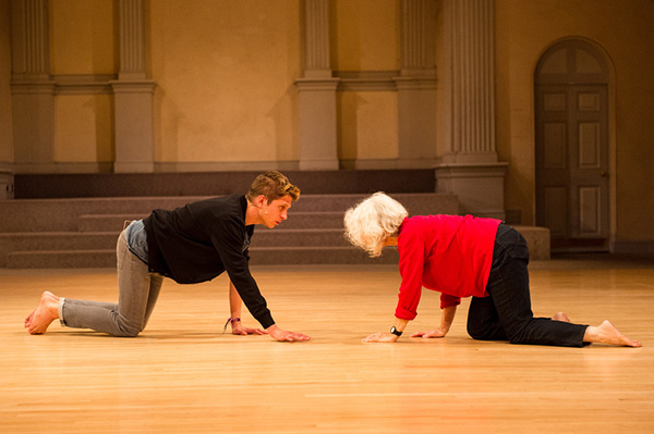 Brennan Gerard (left) performing with Simone Forti in <em>That Fish is Broke</em> at Danspace Project, St. Mark’s Church, New York, NY, 2012. Photo: Ian Douglas.
