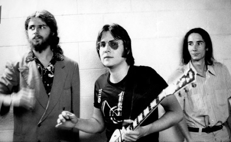 L to R: Jim Shaw, Ron Asheton, and Mike Kelley at Second Chances in Ann Arbor, 1975. Photo: Cary Loren.