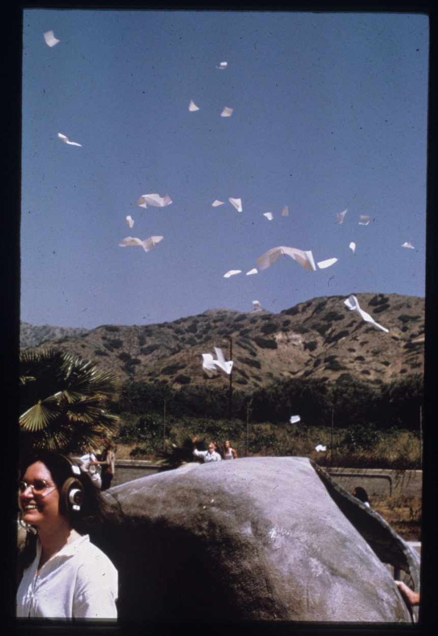 Alison Knowles with Norman Kaplan, <em>Poem Drop Event, May 1971, House of Dust</em>, 1969–75, California Institute of the Arts, Valencia, CA, destroyed, photographer unknown © Alison Knowled